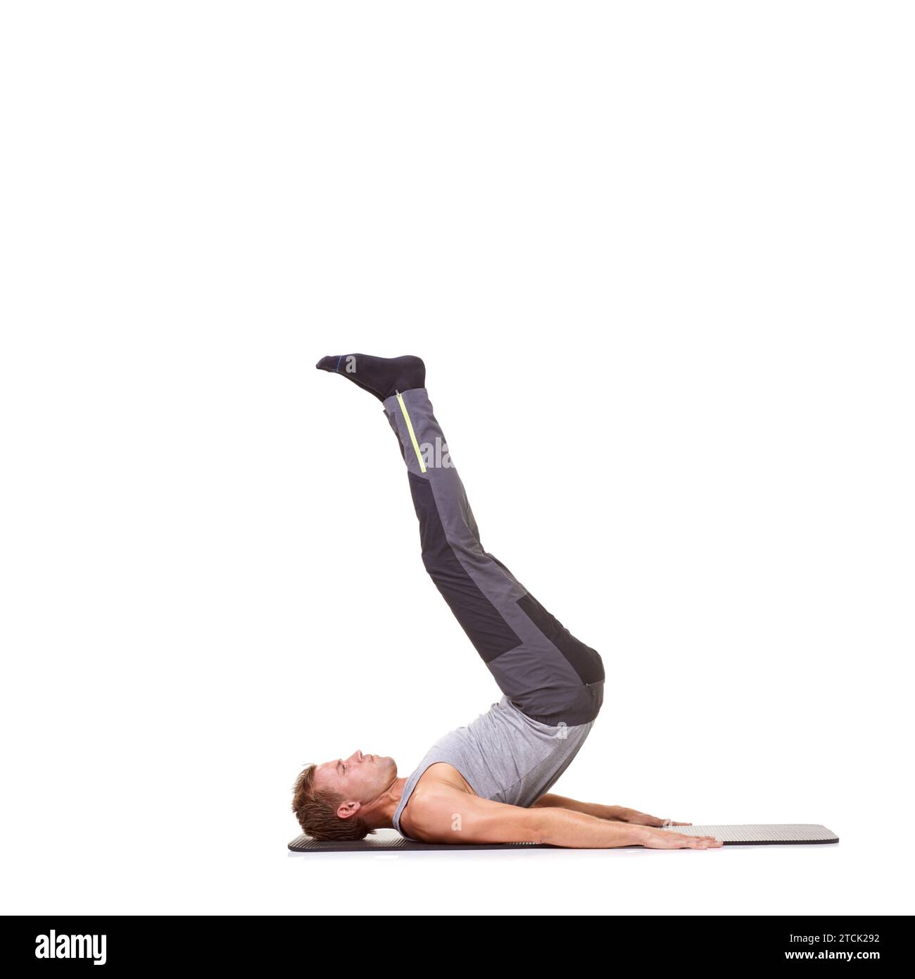 Man lifting legs gym Cut Out Stock Images & Pictures - Alamy