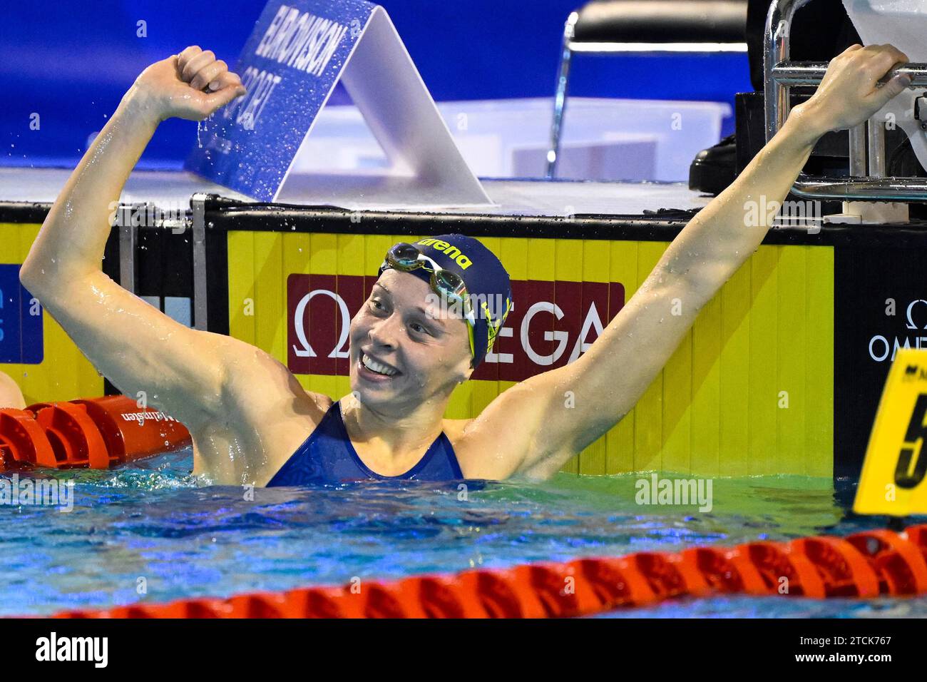 Louise Hansson of Sweden celebrates after winning the gold medal in the 100m Butterfly Women Final during the European Short Course Swimming Championships at Complex Olimpic de Natație Otopeni in Otopeni (Romania), December 9th, 2023. Stock Photo