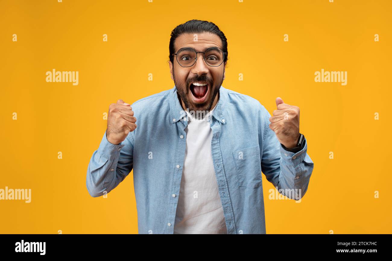Overjoyed millennial middle eastern young hi-res stock photography and ...