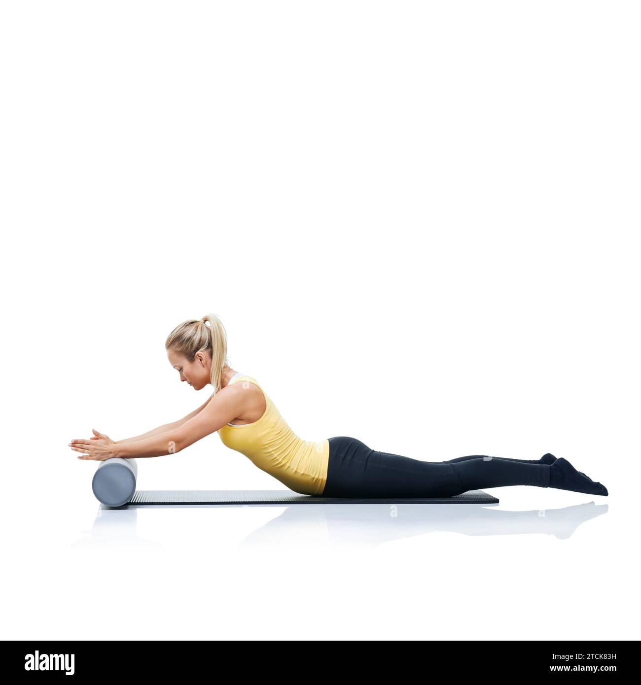 Pilates, foam roller and woman in a studio for workout, stretching or ...