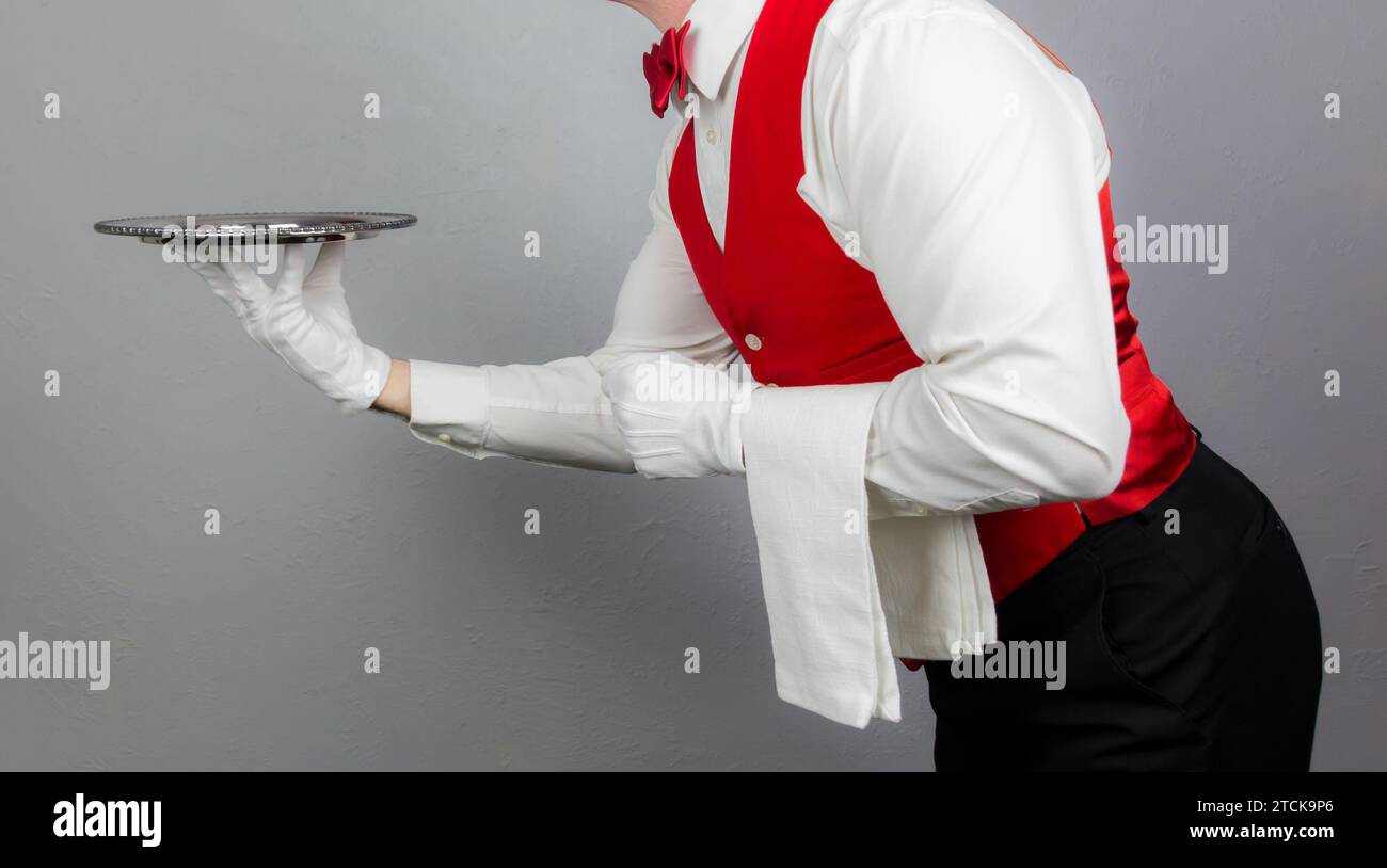 Vintage waiter tray hi-res stock photography and images - Alamy
