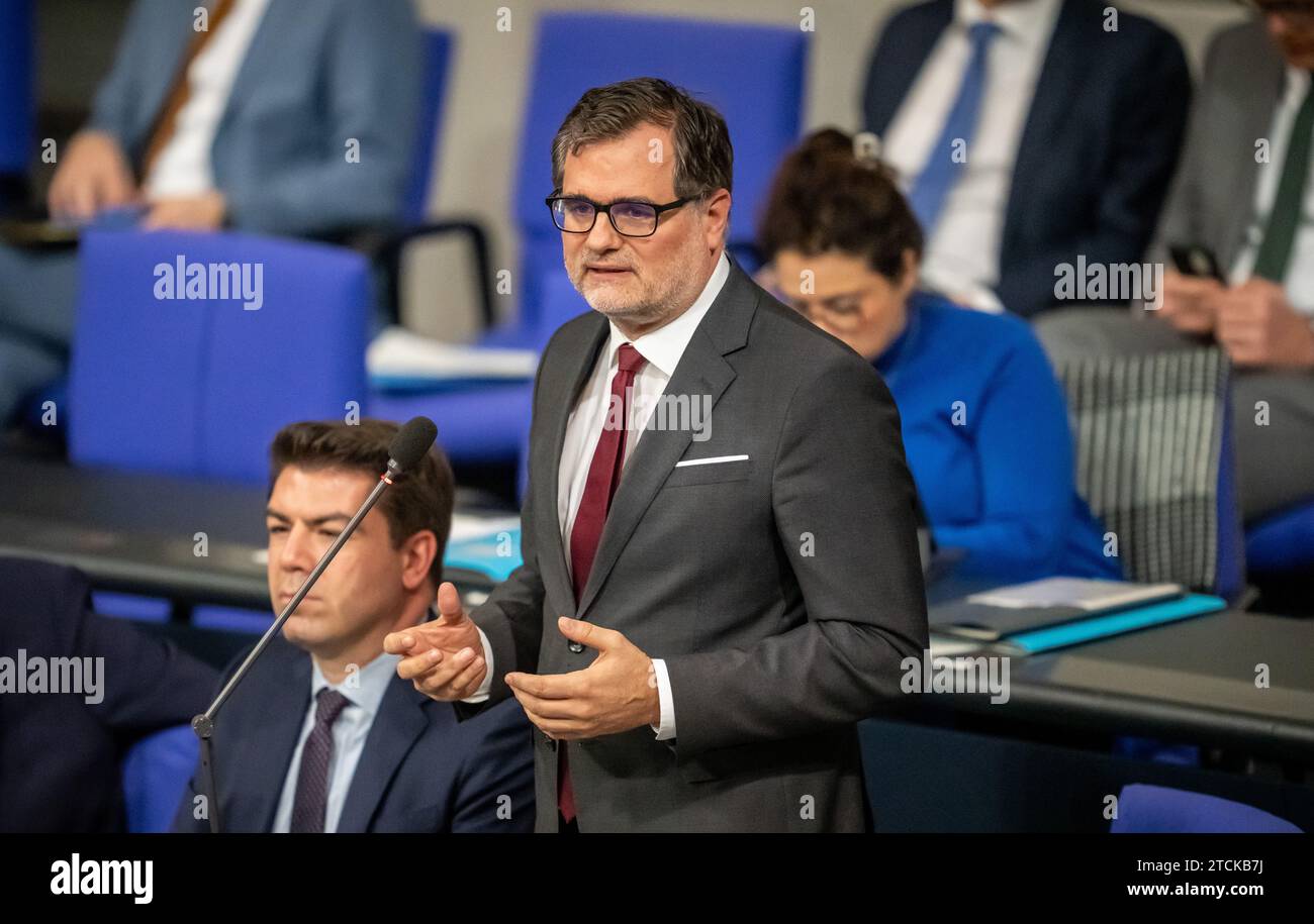 Berlin, Germany. 13th Dec, 2023. Wolfgang Schmidt (SPD), Minister of the Chancellery, speaks during the questioning of the Federal Government in the plenary chamber of the Bundestag. Credit: Michael Kappeler/dpa/Alamy Live News Stock Photo