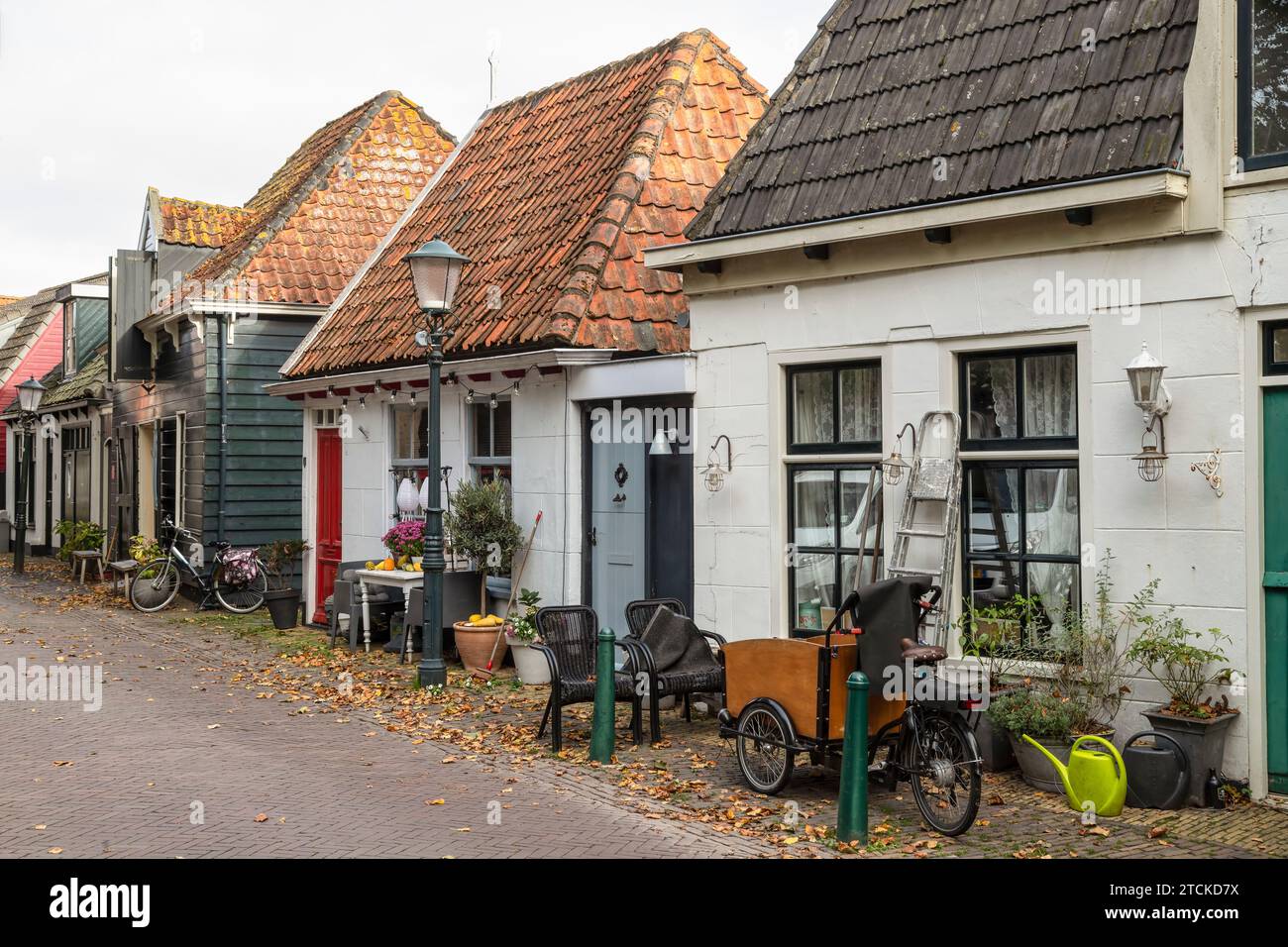 Small street with old small picturesque houses in the center of Den Burg on the Wadden Island of Texel Stock Photo