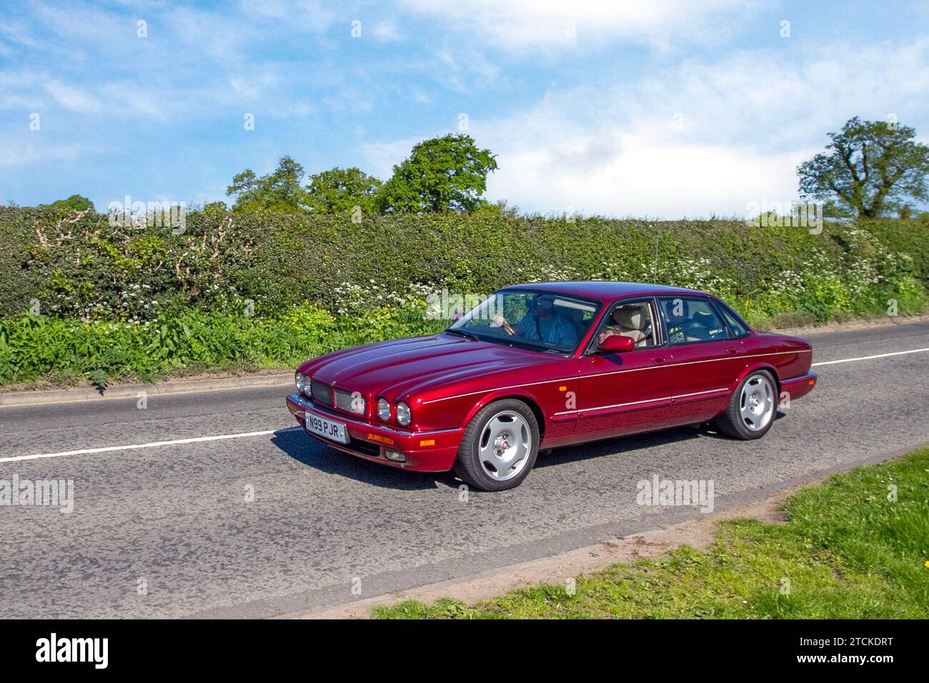 1996 90s nineties Jaguar Xjr Auto V6 S/C SWB Auto Red Car executive Saloon Petrol 3980 cc; Vintage, restored classic motors, automobile collectors motoring enthusiasts, historic veteran cars travelling in Cheshire, UK Stock Photo