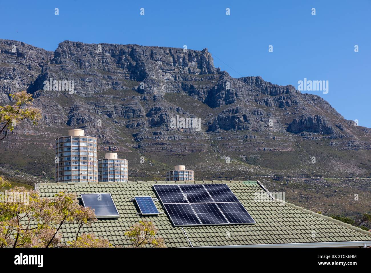 Solar panels, aimed at mitigating 'load-shedding' or blackouts, are seen on a residential roof in a suburb of Cape Town, South Africa. Stock Photo