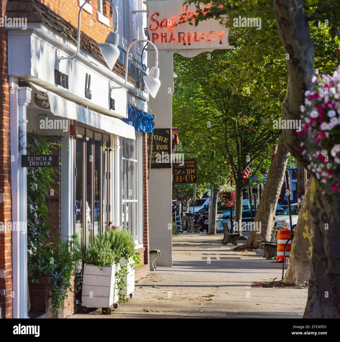 section of sag harbor's sidewalk on main street Stock Photo