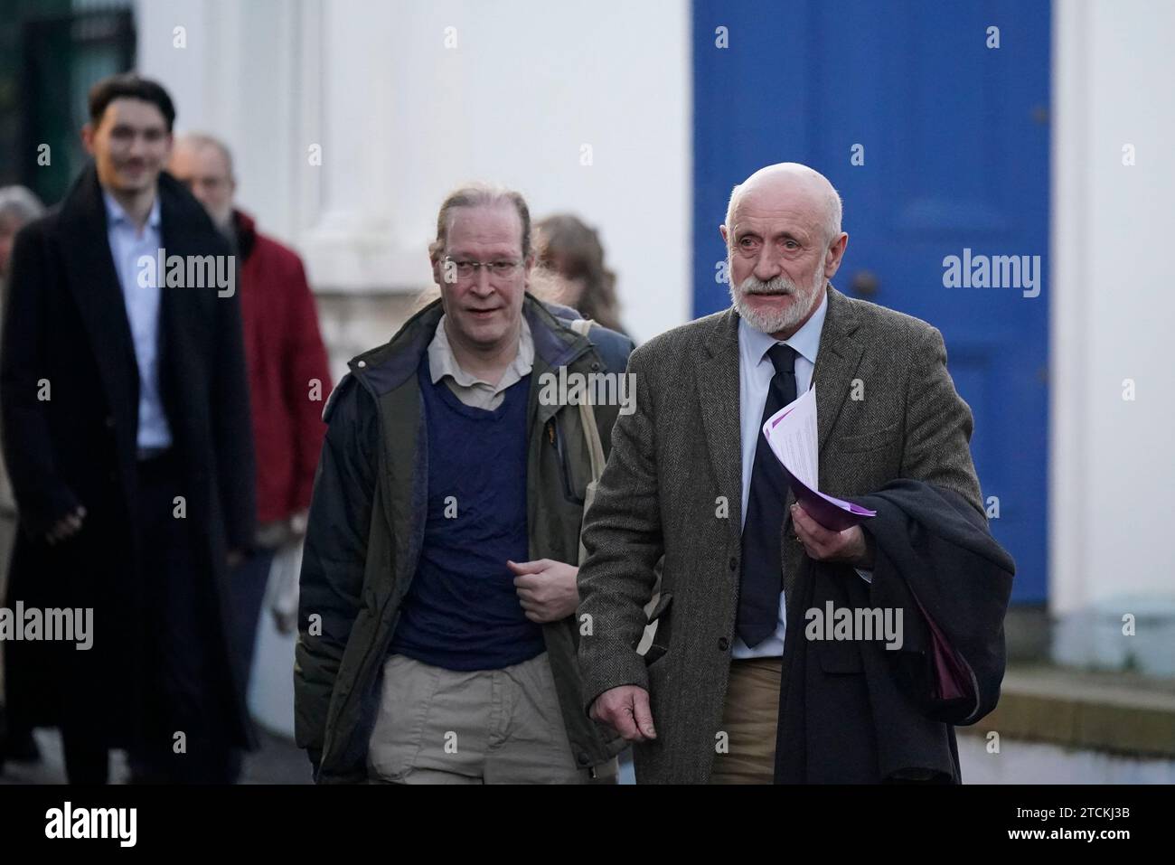 Charles Little (right) arrives to speak to the media outside the