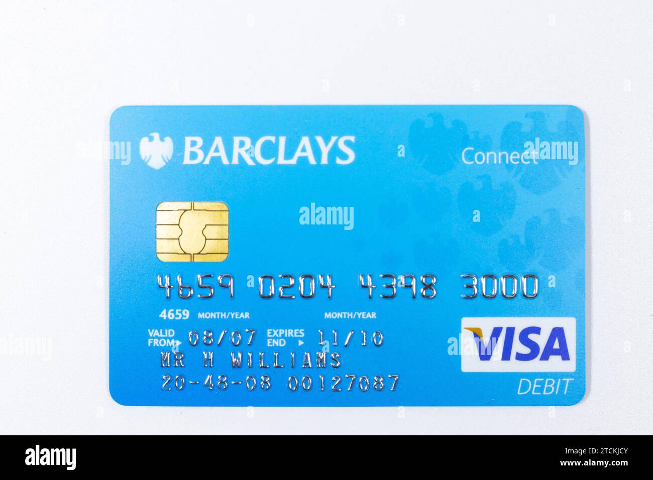 closeup plastic barclays visa connect debit card isolated on white
