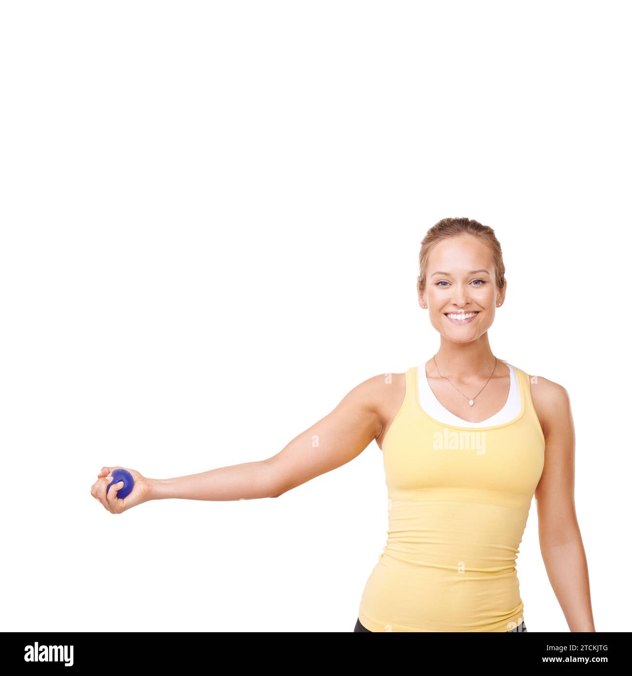 Happy woman, squeeze and stress ball in fitness for exercise against a ...