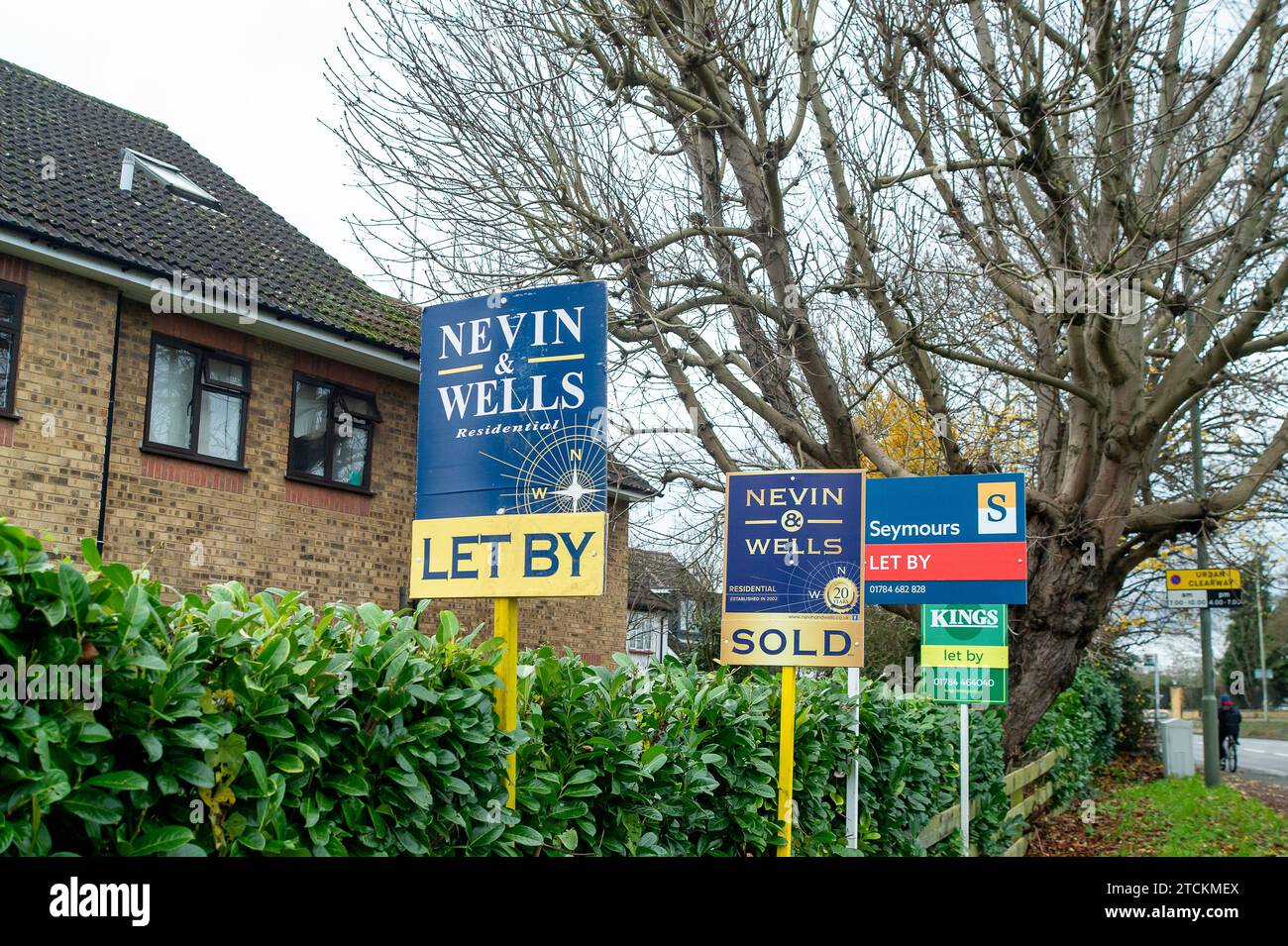 StainesuponThames, UK. 13th December, 2023. Estate agents boards