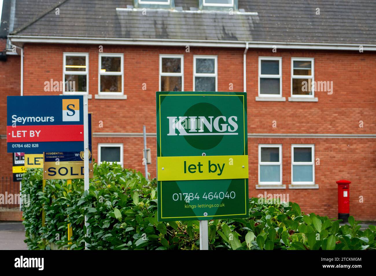 StainesuponThames, UK. 13th December, 2023. Estate agents boards