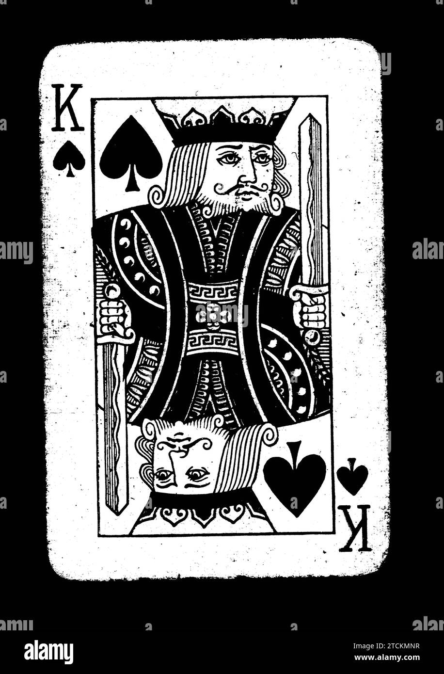 Vintage king of spades playing card in black and white on a black