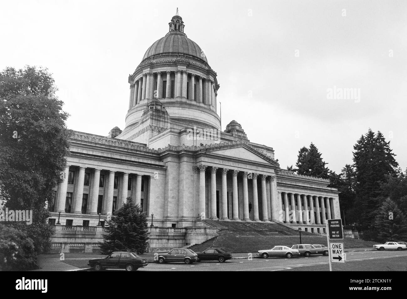 Grainy archival film photograph of the Washington State Capitol Building with cloudy sky.  Shot May 1992. Stock Photo