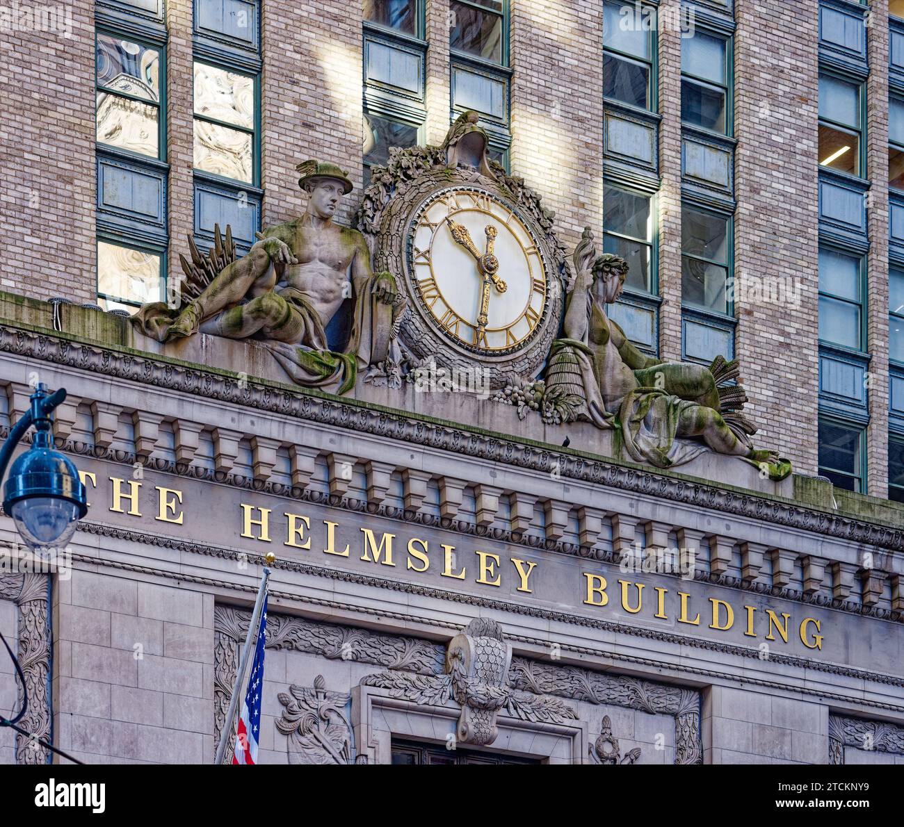 Helmsley Building’s clock on East 46th Street balances the Grand Central Terminal clock on East 42nd Street; Warren & Wetmore designed both buildings. Stock Photo