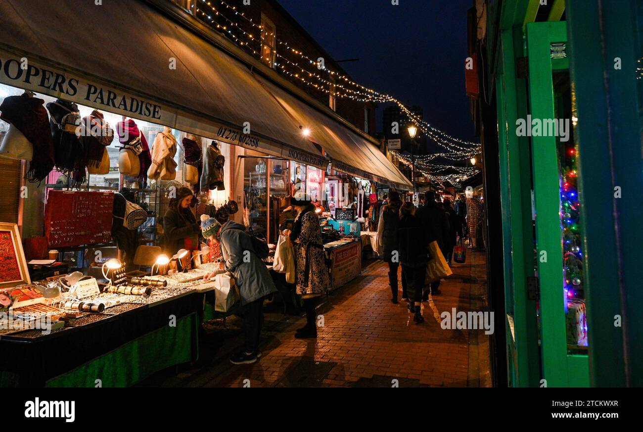 Brighton UK 13th December 2023 - The North Laine area of Brighton is busy with Christmas shoppers as the festive season is in full swing throughout the UK : Credit Simon Dack / Alamy Live News Stock Photo