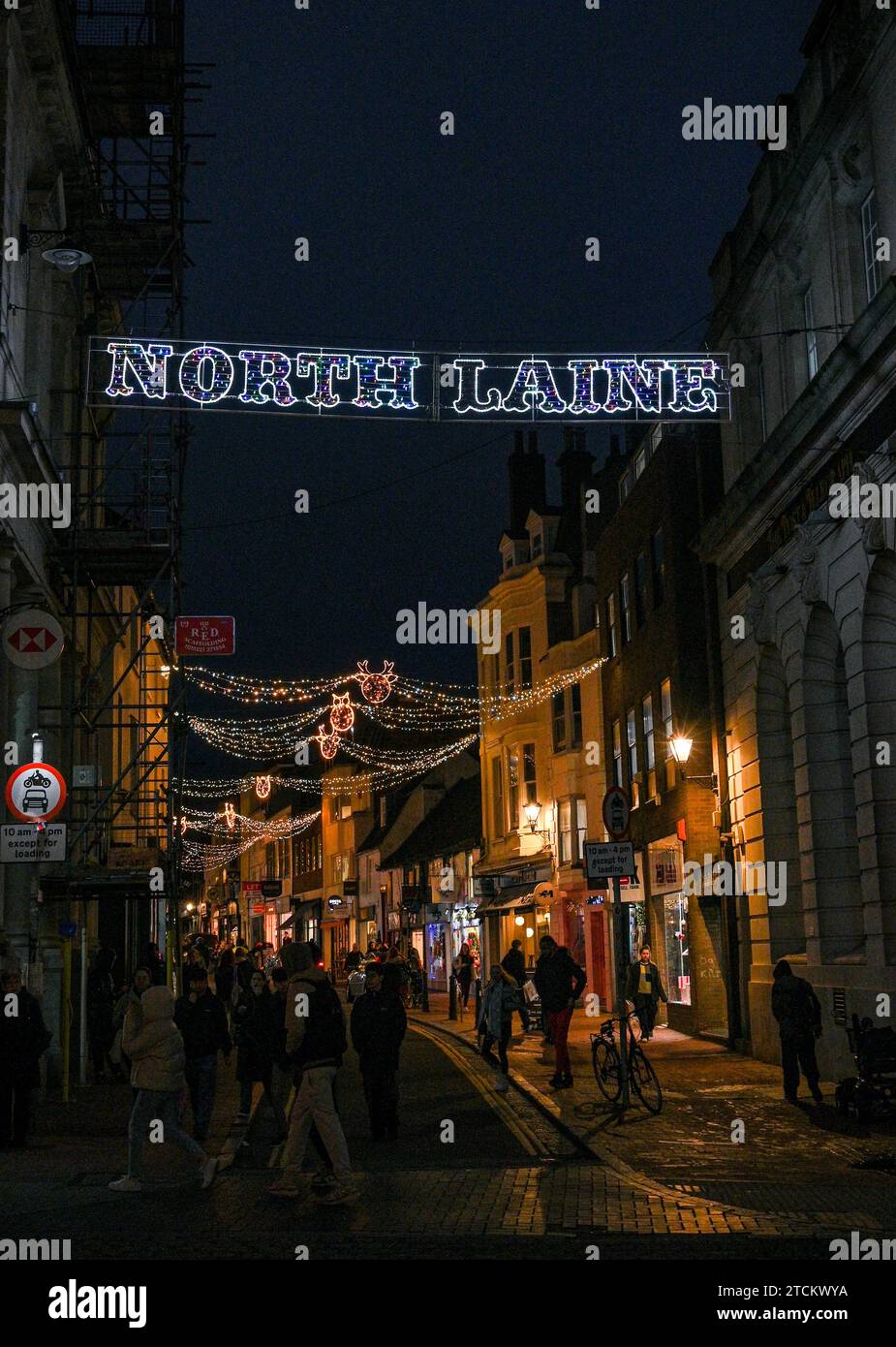 Brighton UK 13th December 2023 - Christmas shoppers in the North Laine area of Brighton as the festive season is in full swing throughout the UK : Credit Simon Dack / Alamy Live News Stock Photo