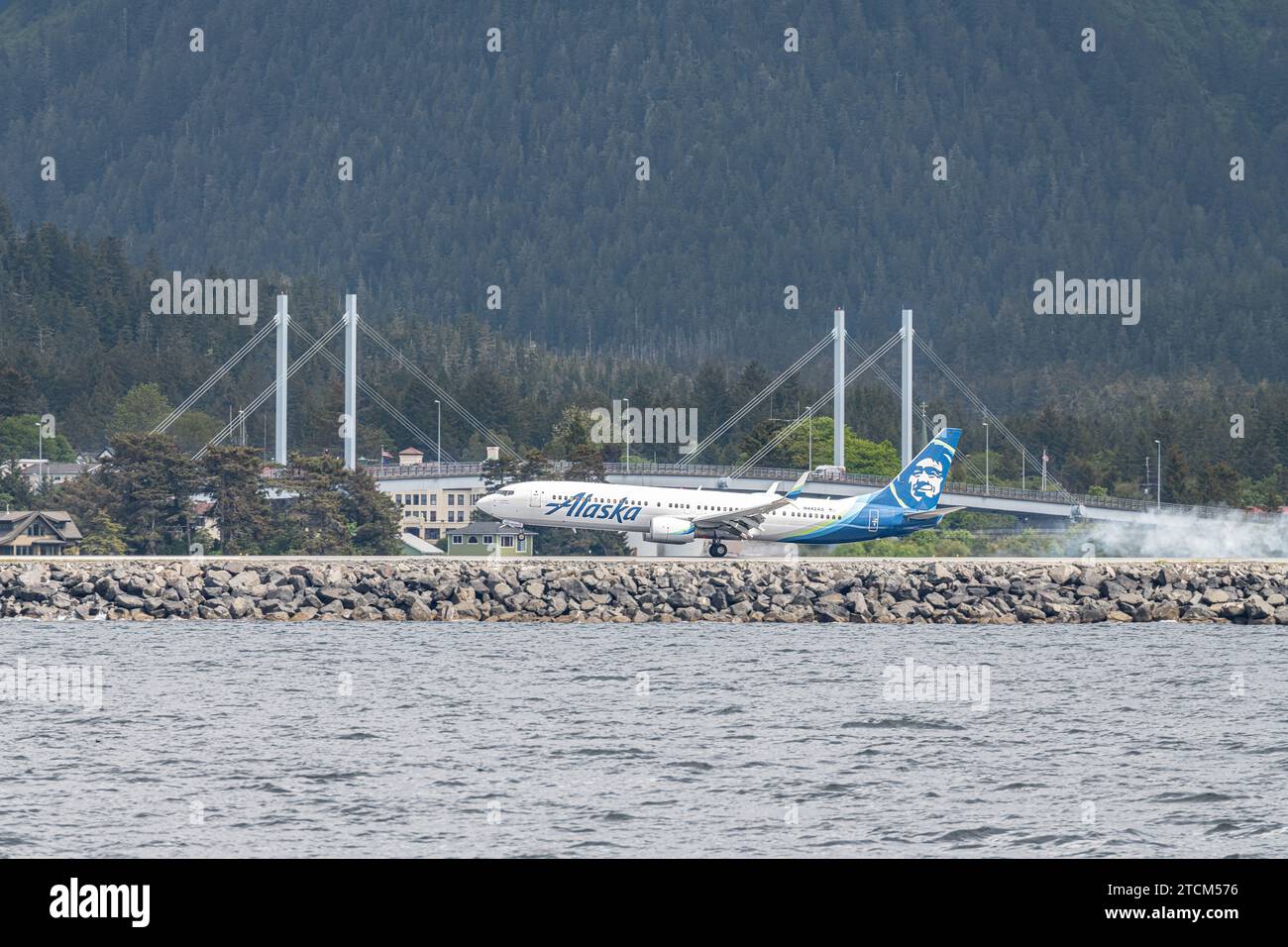 Alaska Airlines Boeing 737 landing at  Sitka Rocky Gutierrez Airport, Alaska, USA Stock Photo