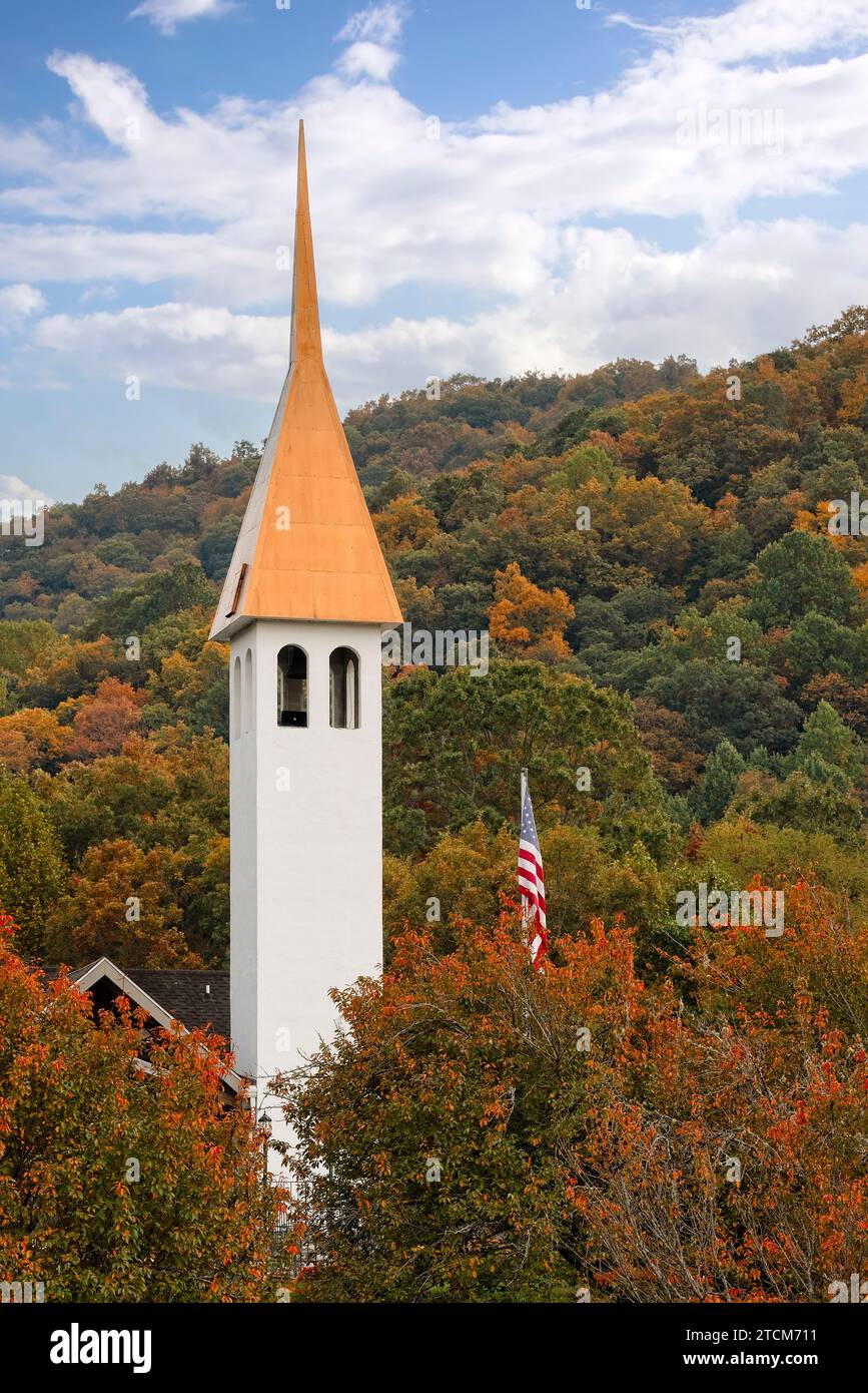 Tall steeple set in the Autumn countryside and colorful and vibrant colors in the landscape Stock Photo