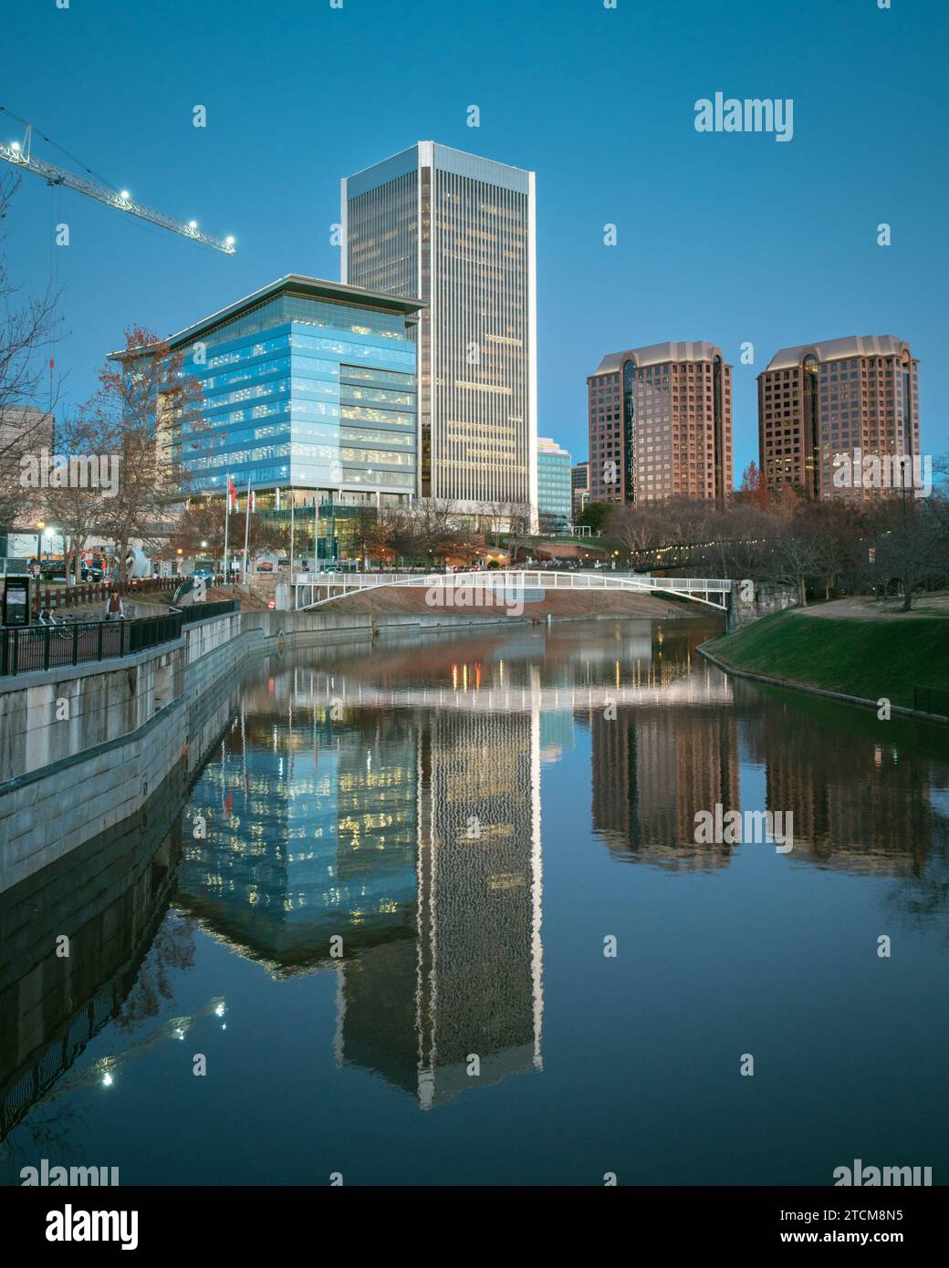 View of the skyline reflecting in the canal from Browns Island in Richmond, Virginia Stock Photo
