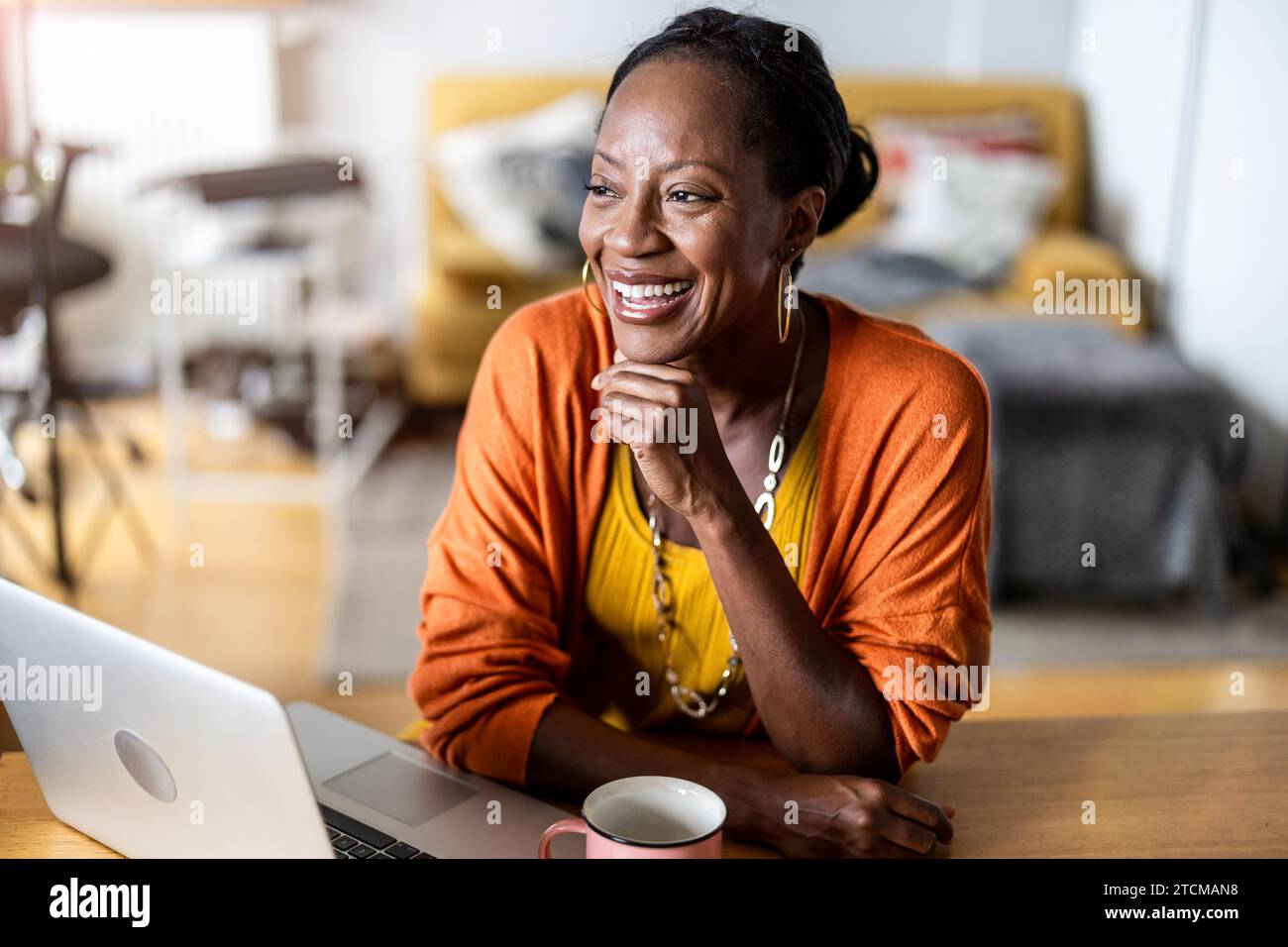 Beautiful african woman working hi-res stock photography and images - Alamy