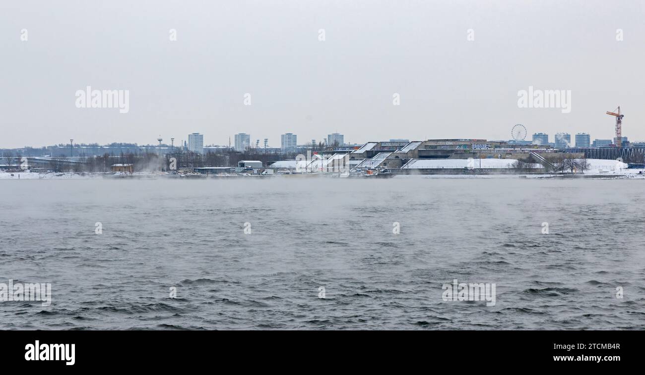 view over the baltic sea to the Tallinn city hall - in estonian Tallinna Linnahall - building in winter Stock Photo