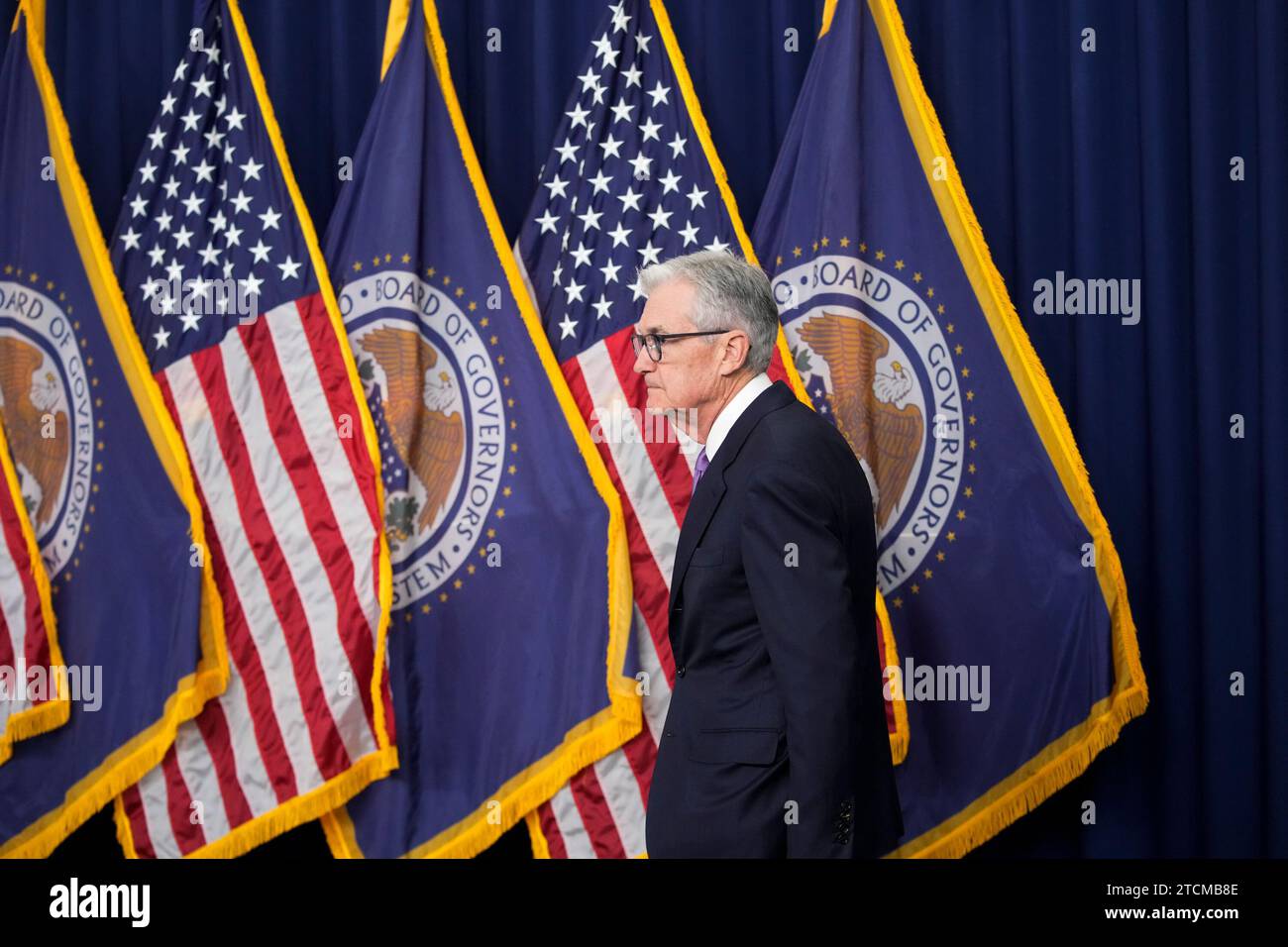 Federal Reserve Board Chair Jerome Powell arrives to speak at a news ...