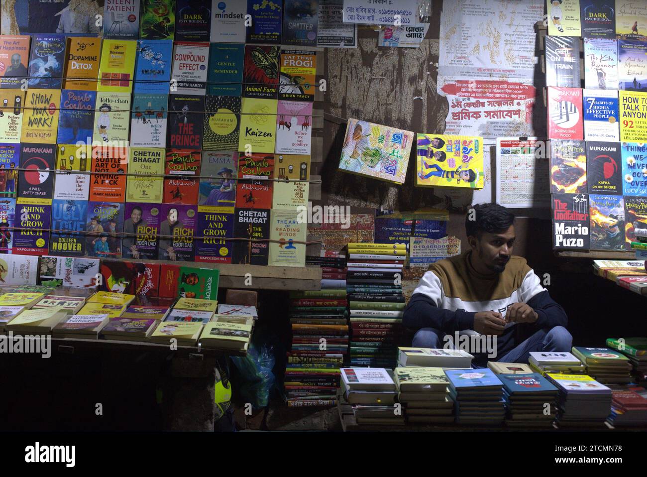 Dhaka, Bangladesh. 14th Dec, 2023. A vendor waits for