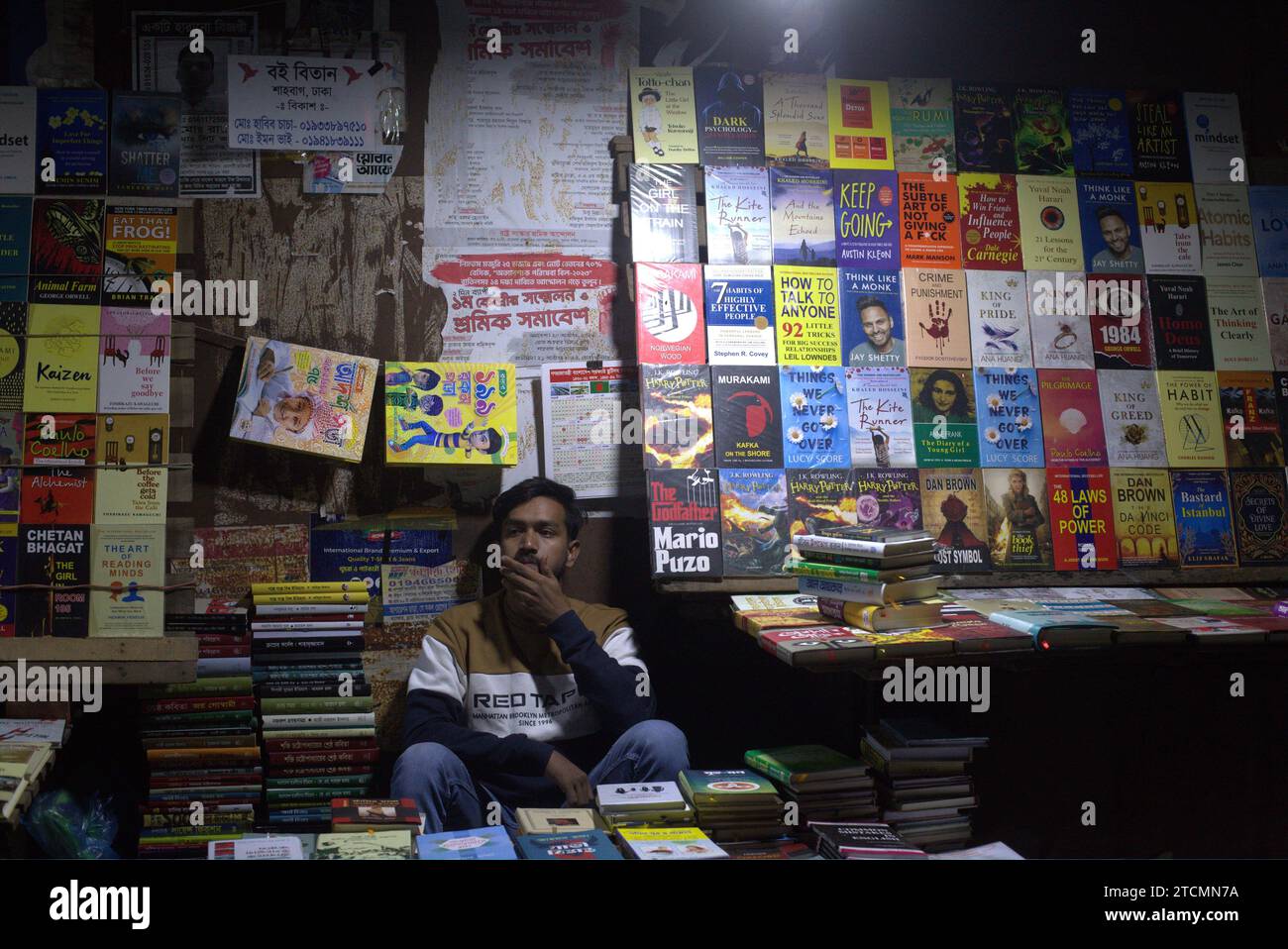 Dhaka, Bangladesh. 14th Dec, 2023. A vendor waits for