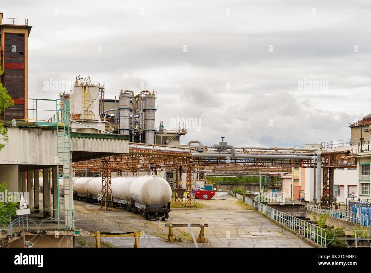 At a chemical plant there are railway tanks with chemicals. Chemical production. Stock Photo