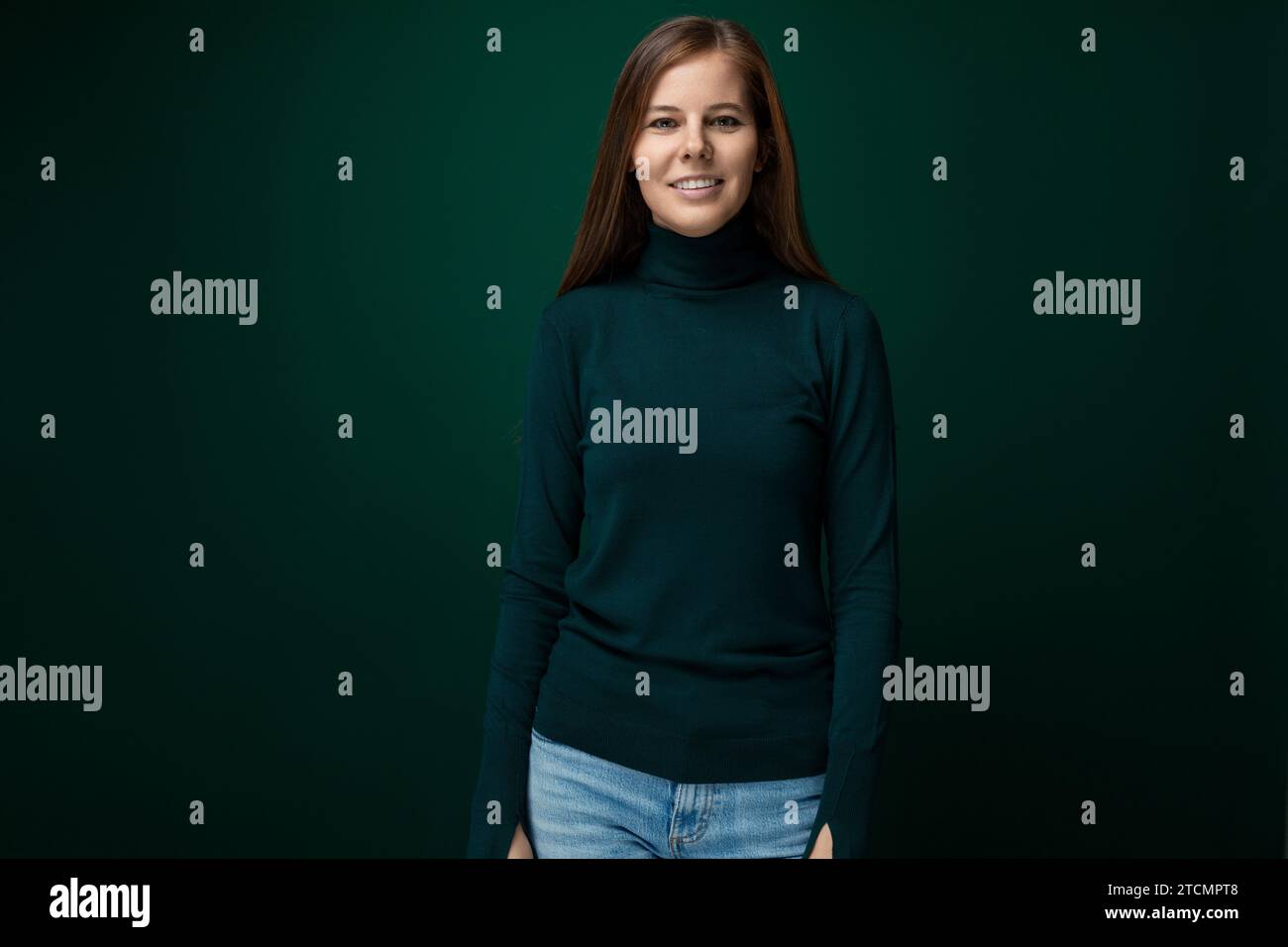 Cute young woman with brown hair wearing a green turtleneck Stock Photo ...