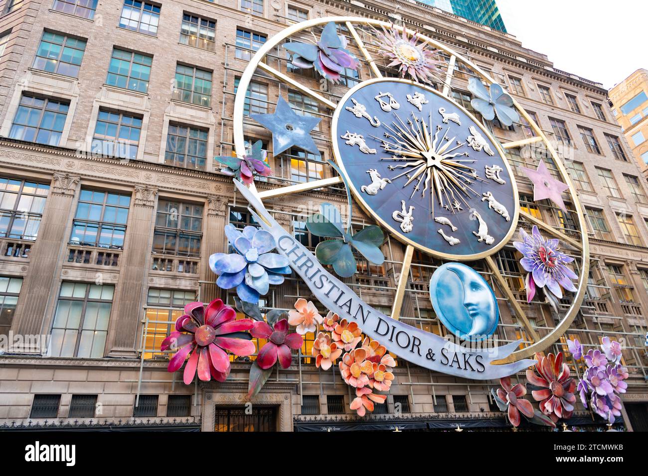 New York City USA November 11 2023 Christian Dior and Saks Fifth Avenue with clock decoration on building Stock Photo Alamy