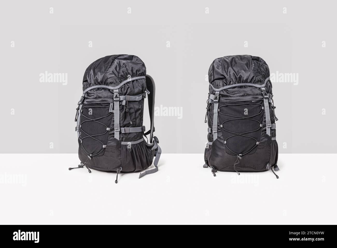 Black travel backpack isolated on a white background. Stock Photo