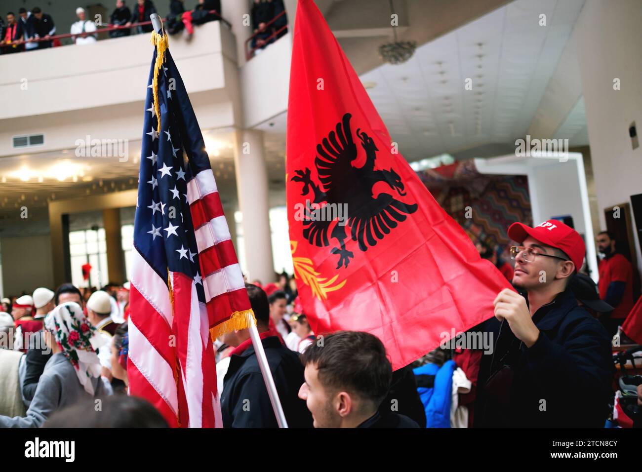 Tirana, Albania November 28 People in traditional attire dancing in a circle with Albanian