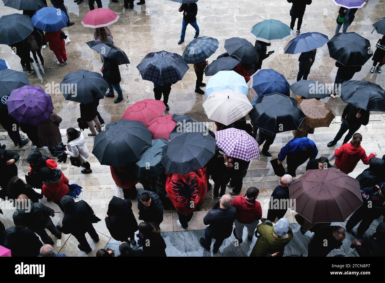 Tirana, Albania - November 28: From above, people wrapped in Albanian