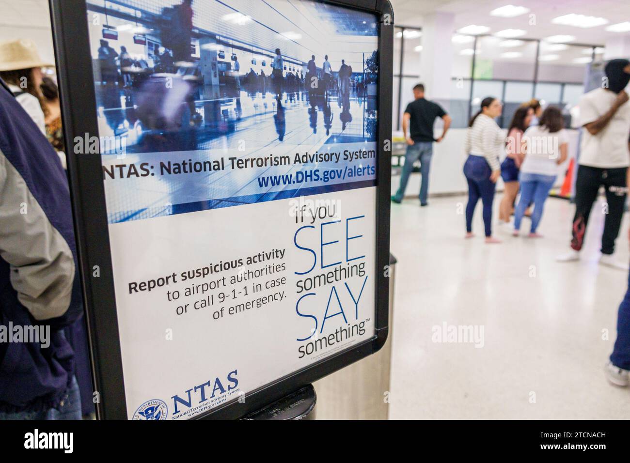 Miami Florida,Miami International Airport MIA,inside interior indoors,terminal concourse,security screening,NTAS National Terrorism Advisory System,se Stock Photo