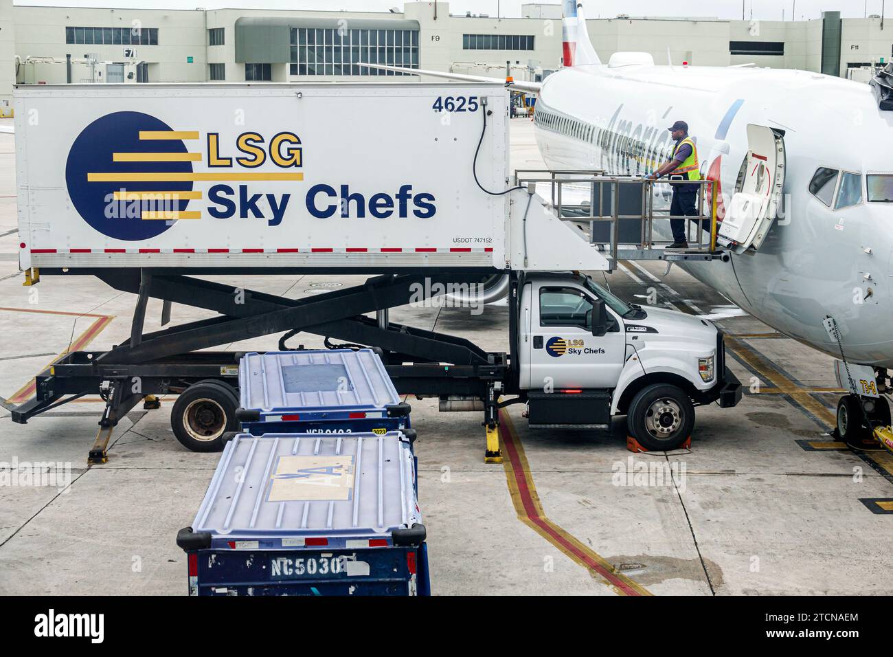 Miami Florida,Miami International Airport MIA,terminal concourse,gate area,tarmac American Airlines jet airliner plane airplane,LSG Sky Chefs catering Stock Photo