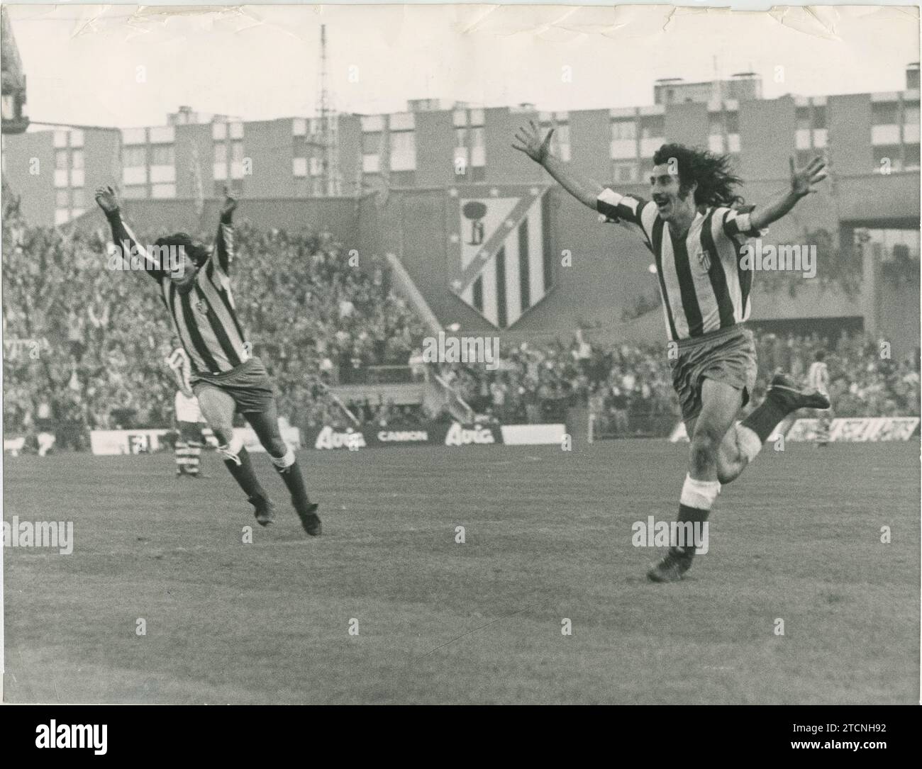 Madrid, 10/28/1973. League match played at the Vicente Calderón stadium, between Atlético de Madrid and Real Sociedad, which ended with the local victory by 5 to 1. In the image, Ayala celebrates the first goal, behind Becerra, runs to congratulate him. Credit: Album / Archivo ABC Stock Photo