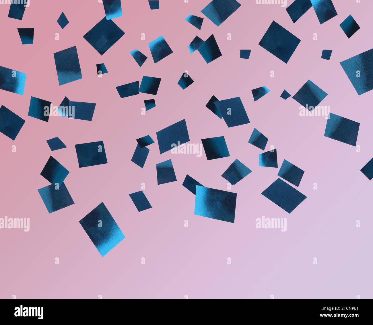 Shiny blue confetti falling on gradient pink background Stock Photo - Alamy