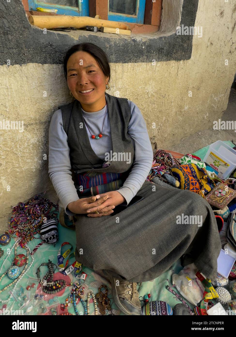 A local woman sells her wears in Yara village - Mustang District, Nepal Stock Photo