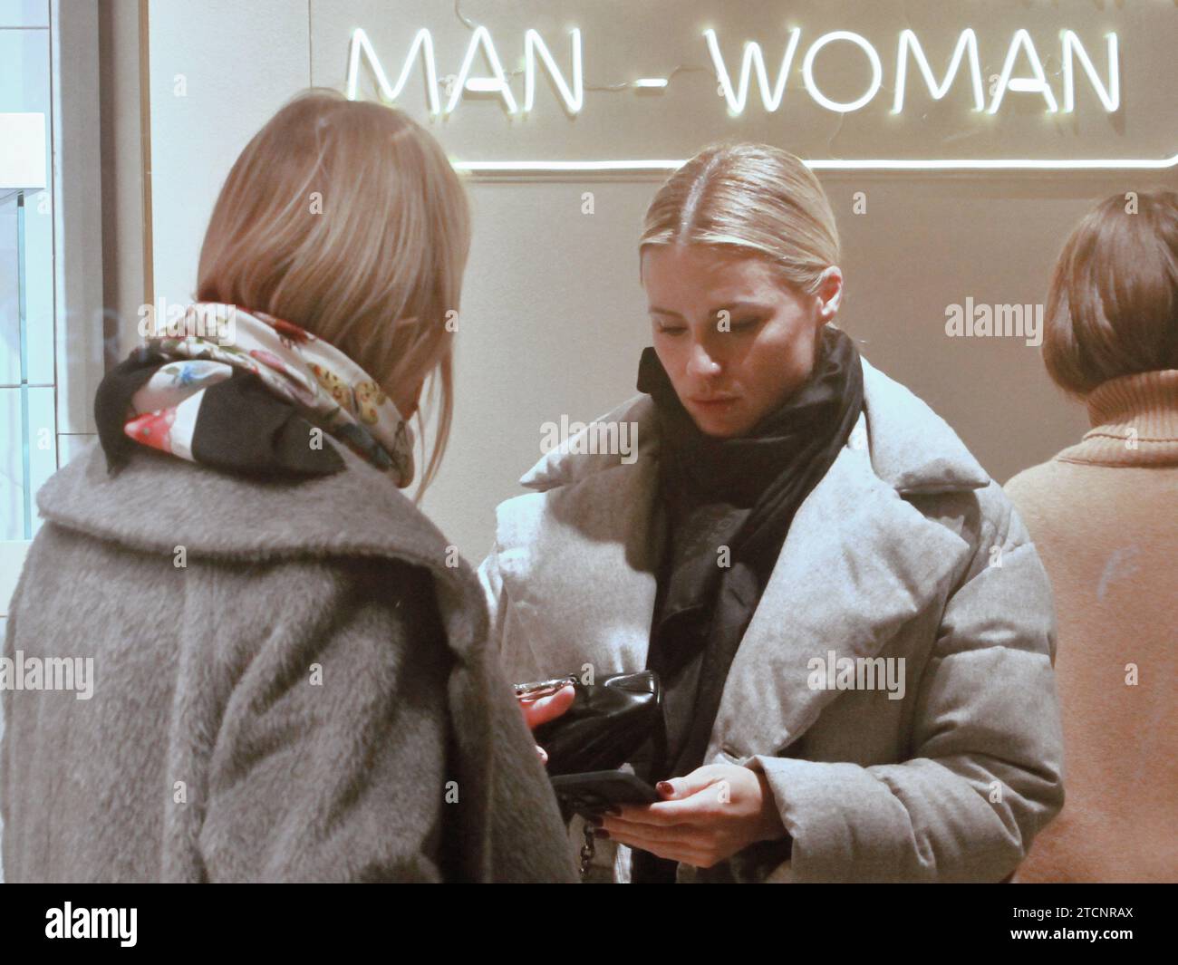 Milan, . 13th Dec, 2023. 12/13/2023 Milan Ph. Paolo Della Bella Michelle Hunziker shopping at 'Falconeri' and walking in Via Monte Napoleone, where she is stopped by her fans for the ritual selfie. Credit: Independent Photo Agency/Alamy Live News Stock Photo