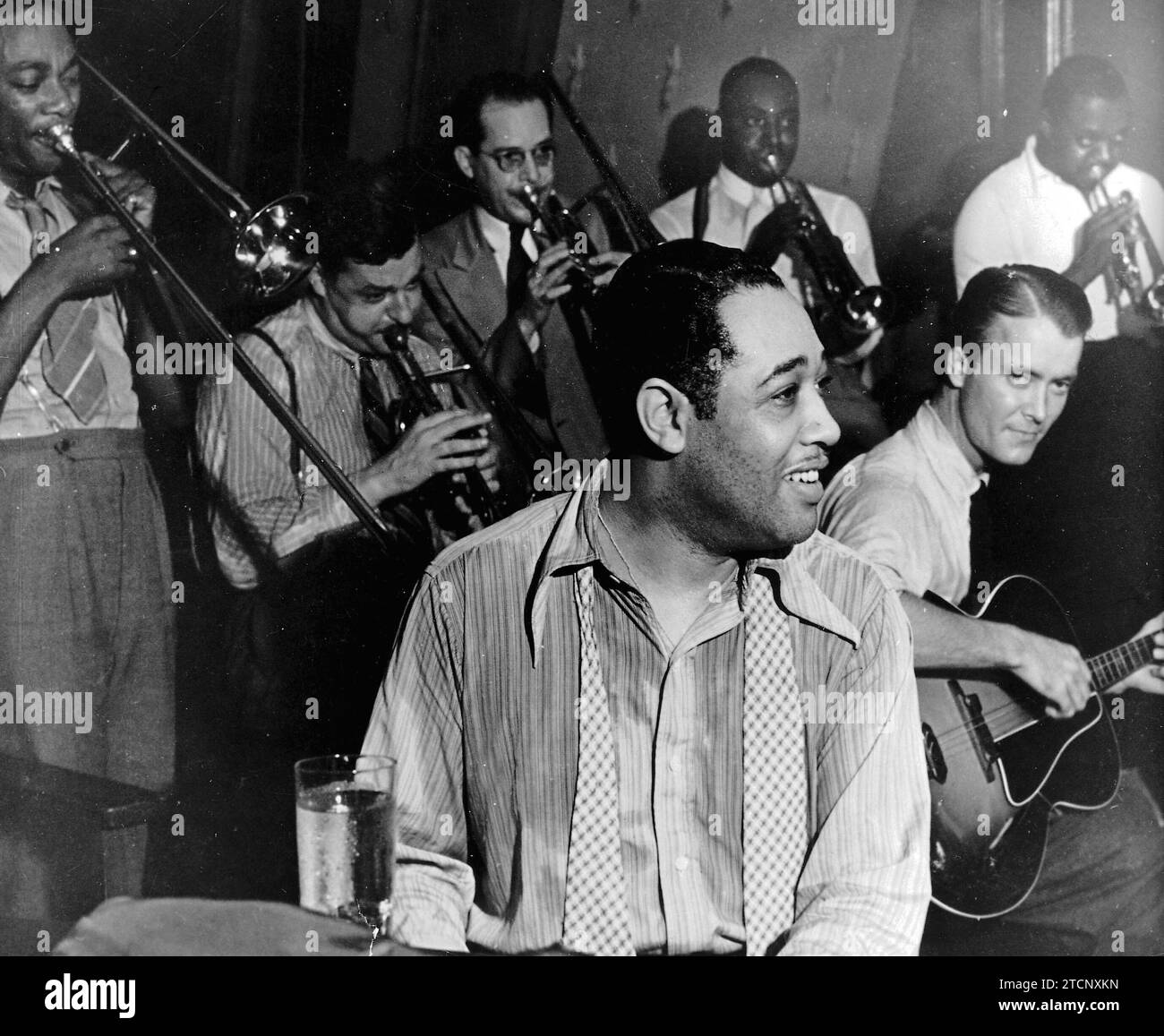 Duke Ellington, born in Washington, is the representation of the New Orleans or Harlem Jazz style. This photograph, taken in 1930, shows guitarist Eddie Condon on the right. Ellington became more famous not so much as a jazz pianist, but for his ease in composing and his willingness to conduct the orchestra. Credit: Album / Archivo ABC Stock Photo