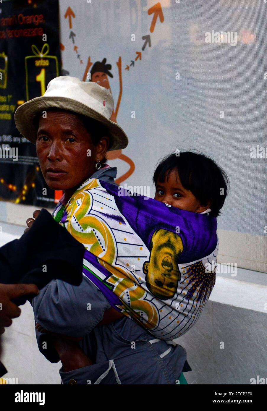 Indian woman carrying baby on hi-res stock photography and images - Alamy