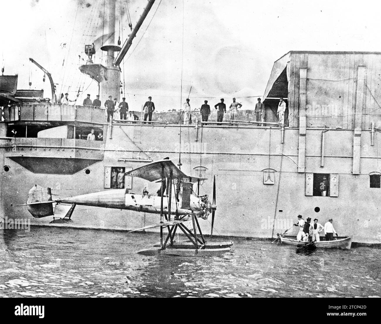 11/30/1912. Maritime aviation in Villefranche. Hydroplane that daily performs flights in the roadstead and whose shed is installed on board the warship that is also seen in the engraving. Credit: Album / Archivo ABC / Louis Hugelmann Stock Photo
