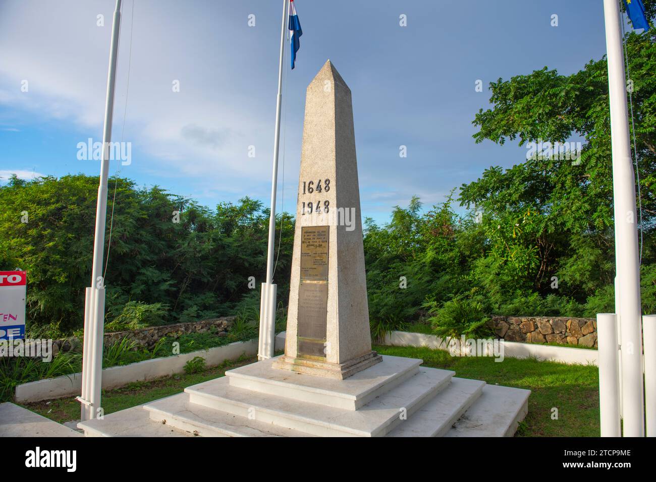 Border Monument between French St Martin and Dutch Sint Maarten on St. Martin Island, Dutch Caribbean. Stock Photo