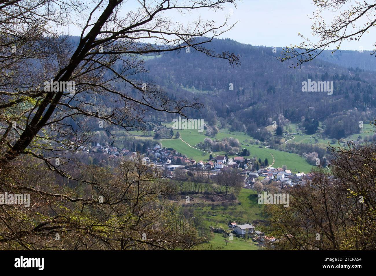Lautertal, Germany - April 24, 2021: Aerial view of buildings in small village below Felsenmeer on a spring day in Germany. Stock Photo