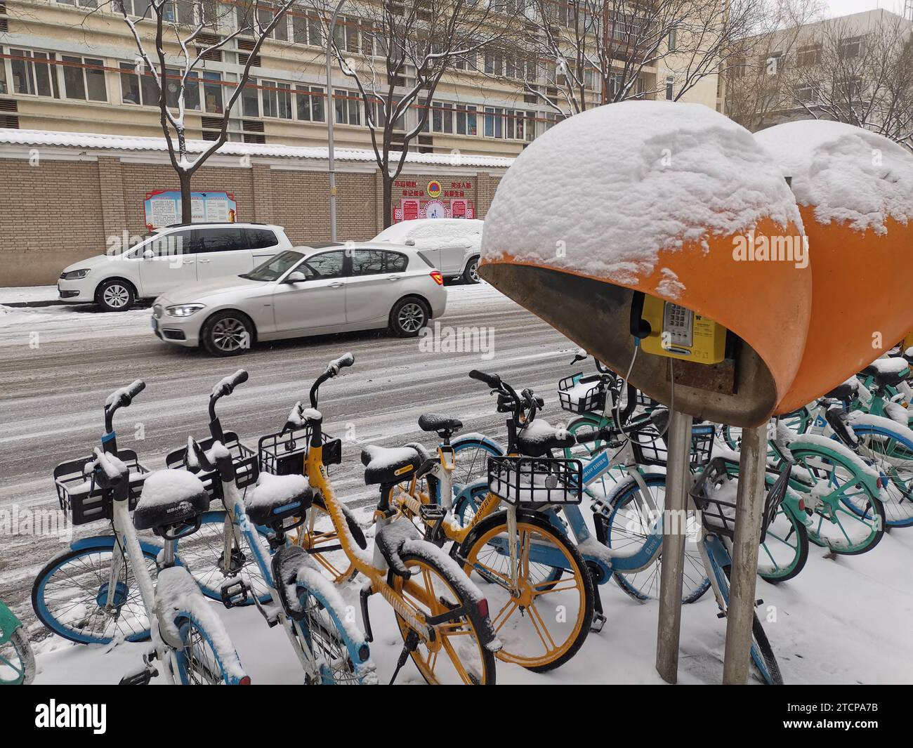 BEIJING, CHINA - DECEMBER 13, 2023 - Vehicles drive in snow in Beijing ...