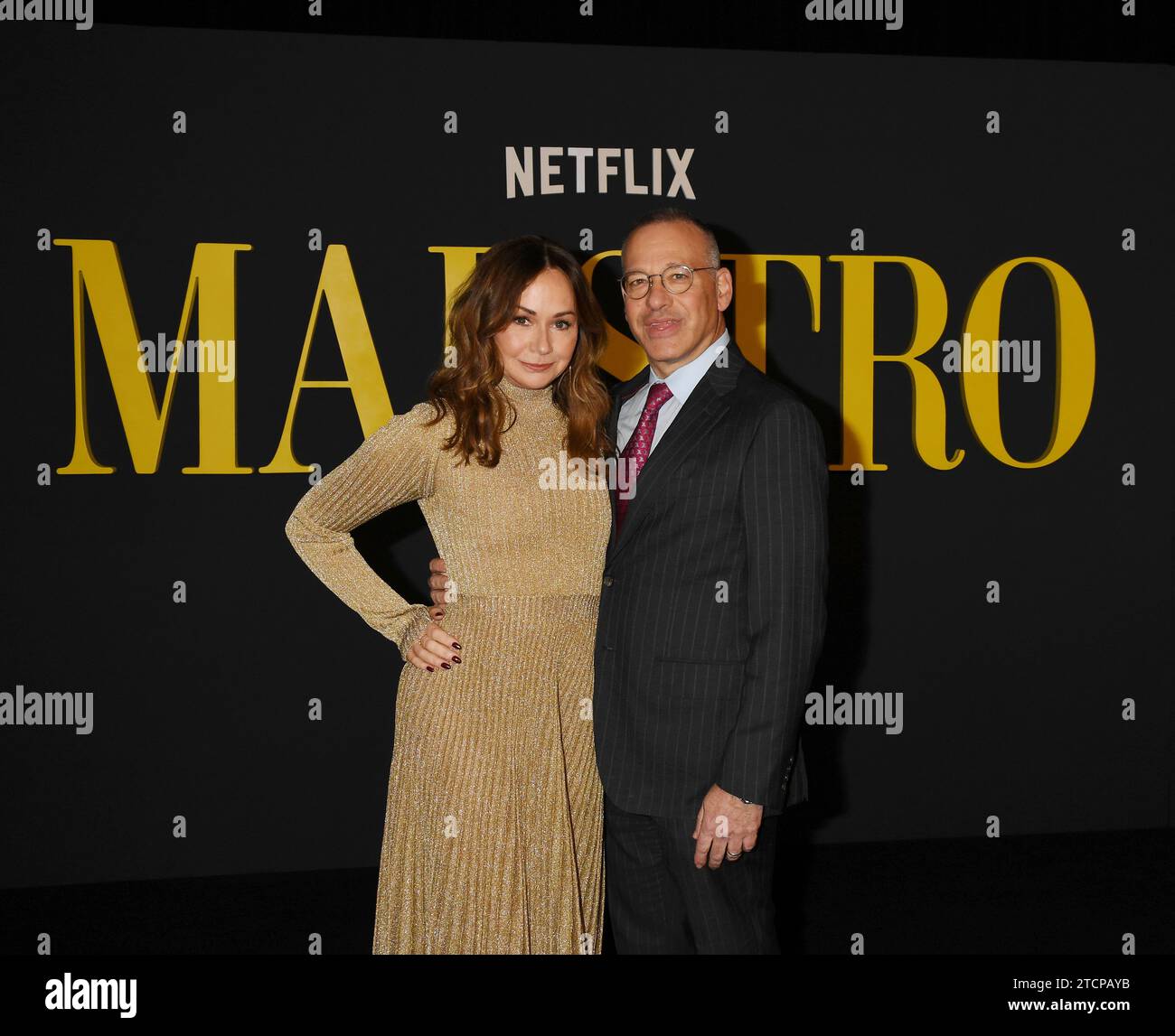 LOS ANGELES, CALIFORNIA - DECEMBER 12: (L-R) Kristie Macosko Krieger and Mark Krieger attend Netflix's 'Maestro' Los Angeles photo call at the Academy Stock Photo