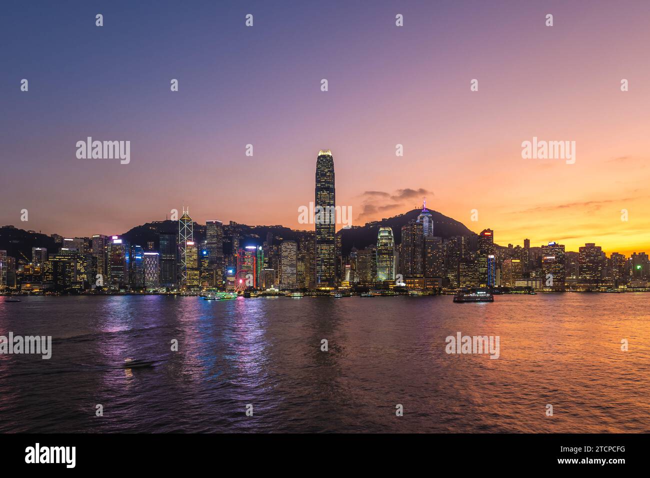 night view of victoria harbor and hongkong island in hong kong, China Stock Photo