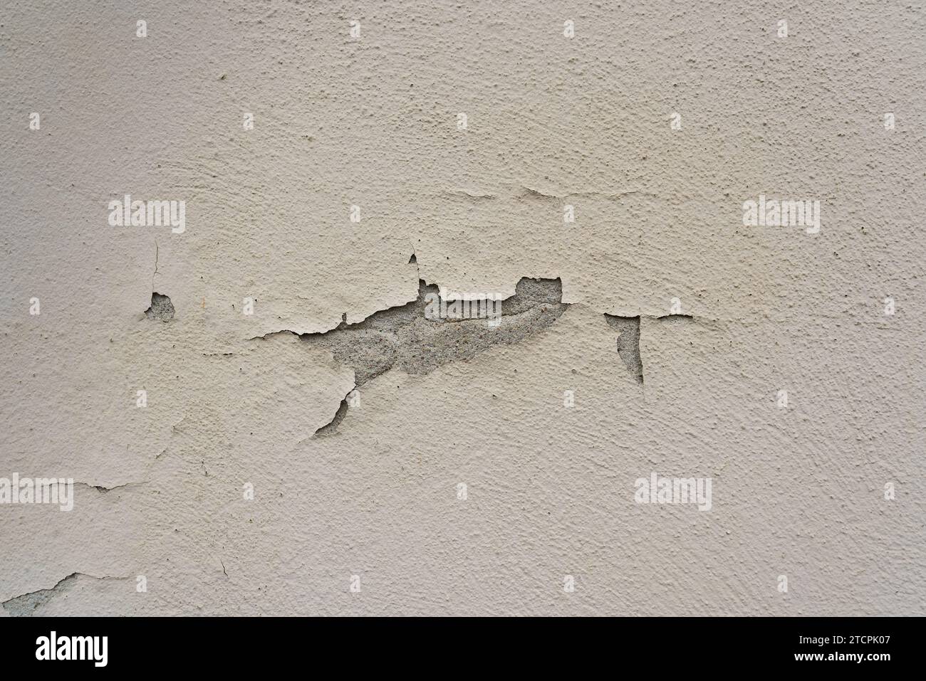 Peeling old paint on a dilapidated facade in the old town of Stralsund in Germany Stock Photo