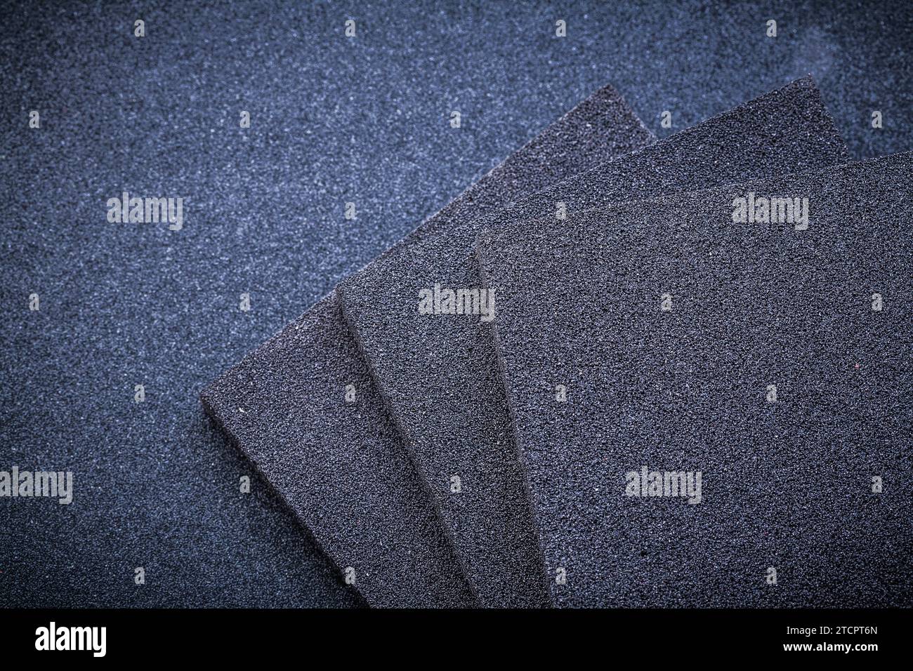 Sanding sponges on glass paper horizontal image Stock Photo Alamy